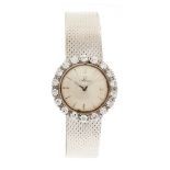 Reloj Omega para señora en oro blanco y bisel con diamantes.