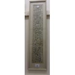 Chinese silkwork sleeve panel of floral and landscape design in a cream frame