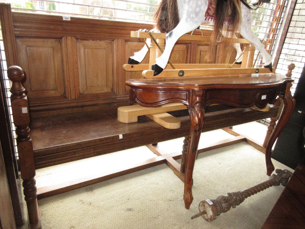 Late 19th / early 20th Century mahogany hall bench having panelled back, raised on turned supports