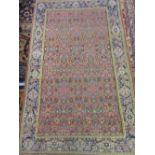 Small Indo Persian rug with a floral design on pink ground together with a small Persian mat with