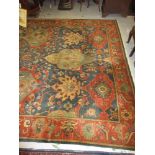 Agra carpet of all-over floral design on burgundy ground with multiple borders, 119ins x 167ins Some