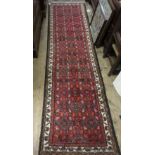 Small Hamadan runner with all-over Herati design on a red ground with borders