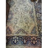 Sparta carpet with an all-over medallion and floral design with borders on an ivory ground, 138ins x