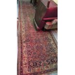 Hamadan runner with all-over Herati design on a red ground centre panel with multiple borders,