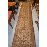 Indo Persian runner with an all-over stylised Herati design on an ivory ground with borders, 12ft