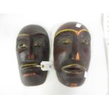 Two native carved painted wall masks