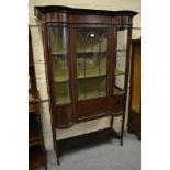 Edwardian mahogany and line inlaid double bow fronted display cabinet with a central bar glazed