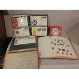 Red Viscount album containing a collection of modern British stamps, together with two albums of