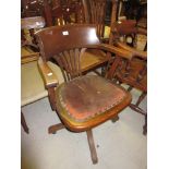 Early 20th Century oak tub shaped adjustable seat office chair