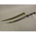 Middle Eastern dagger with embossed brass scabbard and wire inlaid horn grip