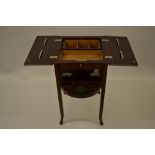 Early 20th Century mahogany work table with a bi-fold top together with a small mahogany bow fronted