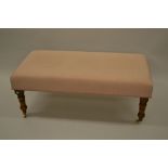 Rectangular upholstered stool on turned mahogany supports in Victorian style 47ins x 24ins x 19ins