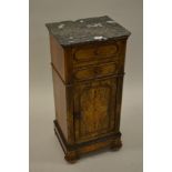 19th Century French figured walnut bedside cabinet with a grey flecked marble top above two