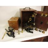 R. and J. Beck, London, gilt brass and black japanned monocular microscope with various lenses in