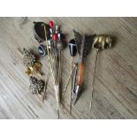 Collection of stick pins to include an elephant and owls head