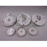 Two Meissen soup bowls with painted floral decoration (at fault), together with a similar plate