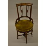 Edwardian mahogany, boxwood, marquetry and line inlaid adjustable seat music chair with pierced