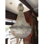 Large patinated metal and glass bag form light fitting, 44ins high