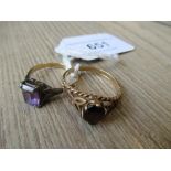9ct Gold and garnet set ring and a 9ct gold silver and amethyst set ring
