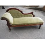 Victorian mahogany chaise longue with green button upholstered back, upholstered seat and a single