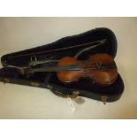 Late 19th or early 20th Century violin with a two piece 14in back, labelled to the interior '