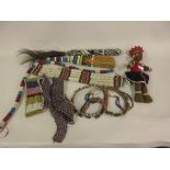 Quantity of native Indian bead work items including: collar, fly whips and a doll Images attached