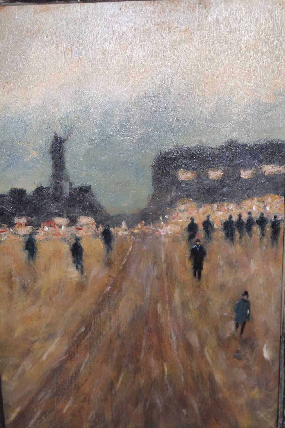 Oil on panel, figures by a road leading to a Continental town, housed in a silvered moulded frame,