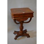 19th Century mahogany work table, the crossbanded hinged top above a shaped frieze and wool bag,