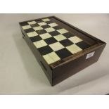 Rosewood bone and ebony inlaid folding chessboard 46cm x 38cm x 6cm thick, various issues and