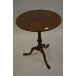 Good quality reproduction circular mahogany tilt-top pedestal table, the parquetry inlaid top on a