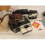 Miscellaneous cameras including a Polaroid in original box, together with opera glasses etc