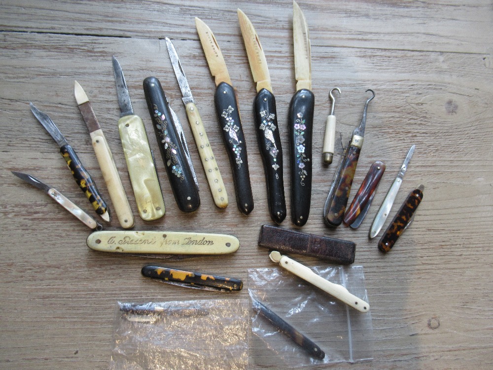 Collection of eleven various small and miniature folding fruit knives, four black lacquer and mother