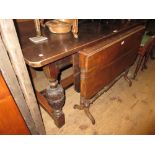 Early 20th Century dark oak refectory style dining table on four carved baluster turned supports