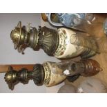 Pair of Satsuma baluster form pottery vases with French bronze oil lamp mounts, together with an