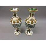 Pair of Bohemian green baluster form vases with white opaque overlay and gilt decoration 26cm tall