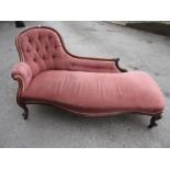 Victorian mahogany chaise longue with pink buttoned upholstery raised on cabriole supports