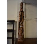 Large carved and stained pine figure of a saint