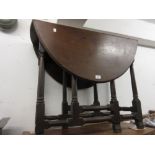 Small late 17th or early 18th Century oak oval gate leg table on baluster turned supports with