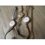 Ladies 18ct gold cased wristwatch together with two ladies 9ct gold cased wristwatches and a 9ct