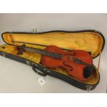 Modern Japanese Suzuki violin, copy of a Stradivarius with bow in a fitted case various cosmetic