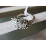 18ct White gold cluster ring set baguette and round brilliant cut diamonds