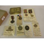 Small collection of various World War I and II medals, two other medals and various cap badges etc