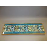 William de Morgan, a group of six framed and mounted tiles of stylised floral design within a