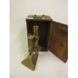 Small 19th Century brass monocular microscope in a mahogany fitted case