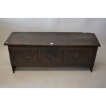 17th Century oak plank coffer with hinged lid and slab ends