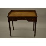 George III mahogany crossbanded and line inlaid washstand, the low gallery back above three