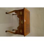 Reproduction walnut lowboy in 18th Century style, the figured crossbanded top above three drawers