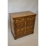 Good quality reproduction oak chest in 17th Century style, the moulded top above two short and three