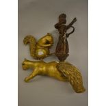 Antique carved wooden figural lamp holder, together with two 20th Century carved giltwood figures of