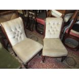 Near pair of 19th Century mahogany button upholstered nursing chairs on turned front supports